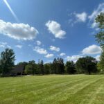 NLLC team member providing professional lawn care service in Niagara Falls, showcasing quality and attention to detail.