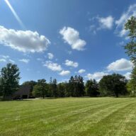 NLLC team member providing professional lawn care service in Niagara Falls, showcasing quality and attention to detail.