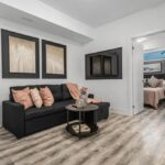 Private patio with BBQ grill at a rental home near Niagara Falls, perfect for up to 4 guests.