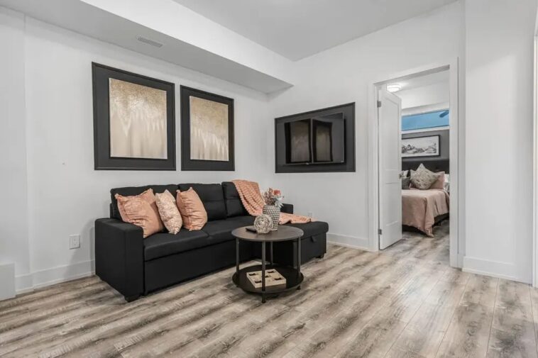 Private patio with BBQ grill at a rental home near Niagara Falls, perfect for up to 4 guests.