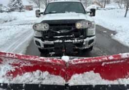 Snow-covered driveway being professionally cleared by NLLC team in Niagara Falls, Canada