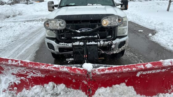 Snow-covered driveway being professionally cleared by NLLC team in Niagara Falls, Canada