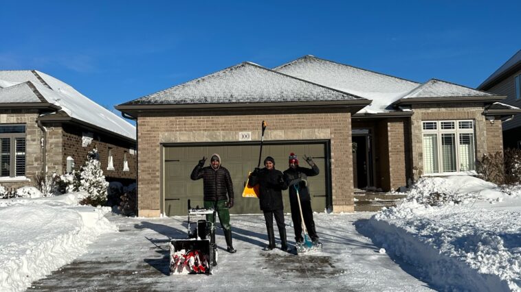 Niagara Falls property exterior with professional landscaping and clean driveway