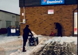 NLLC team clearing snow from a Domino’s Niagara driveway to ensure safe access for customers and deliveries.