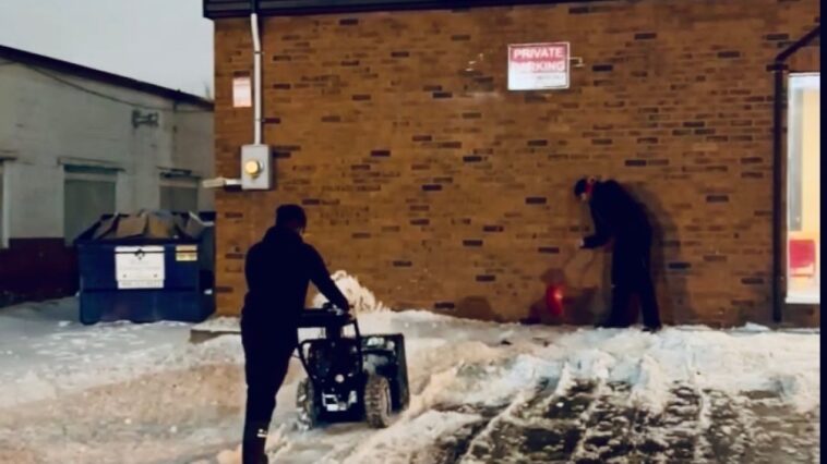 NLLC team clearing snow from a Domino’s Niagara driveway to ensure safe access for customers and deliveries.