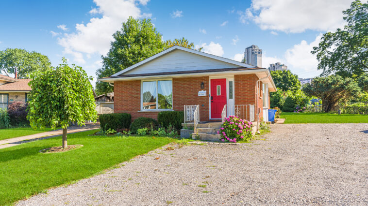 Seasonal lawn care services by NLLC improving property value in Niagara Falls