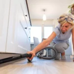 Professional deep cleaning service by NLLC removing dust from hidden areas of a home in Niagara Falls