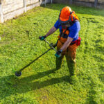 Lawn aeration in progress on a healthy green yard in Niagara Falls