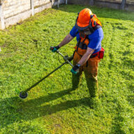 Lawn aeration in progress on a healthy green yard in Niagara Falls