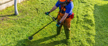 Lawn aeration in progress on a healthy green yard in Niagara Falls
